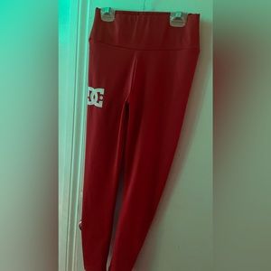 Red DC leggins size small never worn because they never fit me